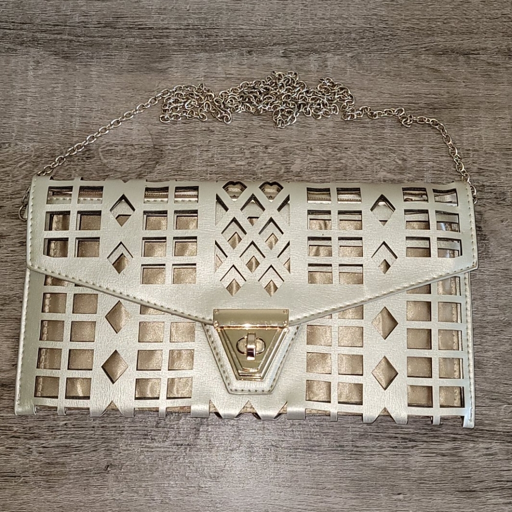 Gold cross body clutch